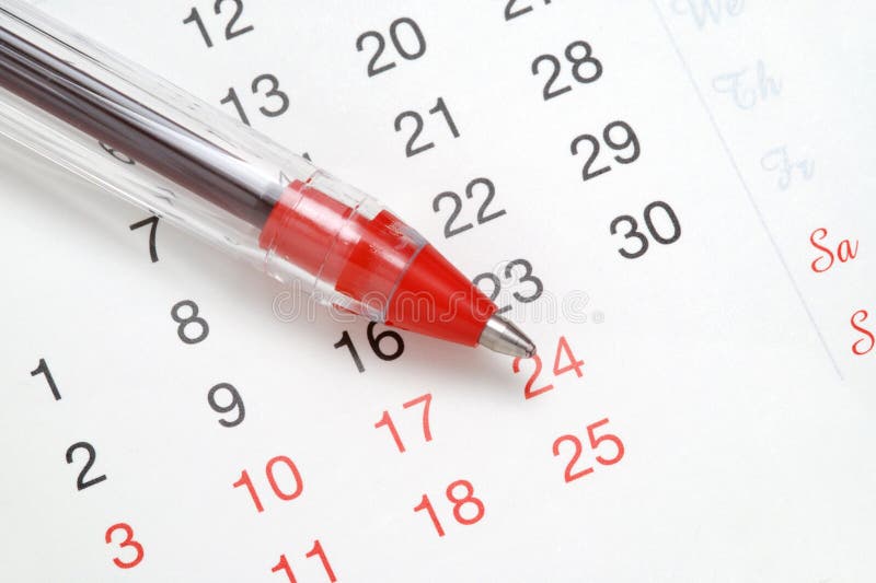 Caneta no calendário fotografia de stock royalty free