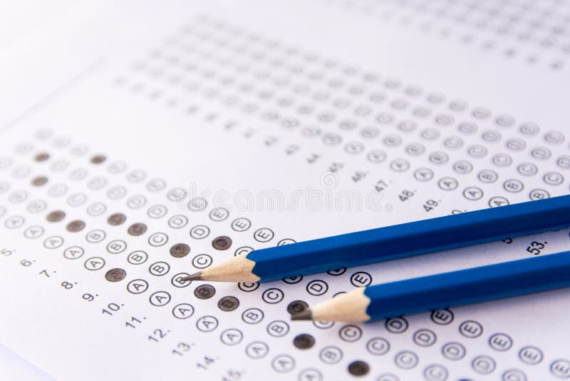 Pencil on answer sheets or Standardized test form with answers b royalty free stock photo