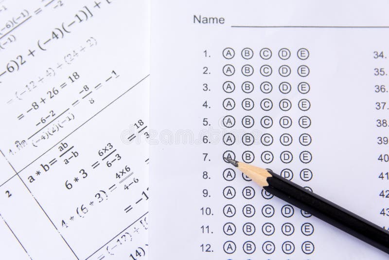 Pencil on answer sheets or Standardized test form with answers b stock photo