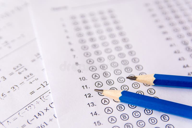Pencil on answer sheets or Standardized test form with answers b stock photography