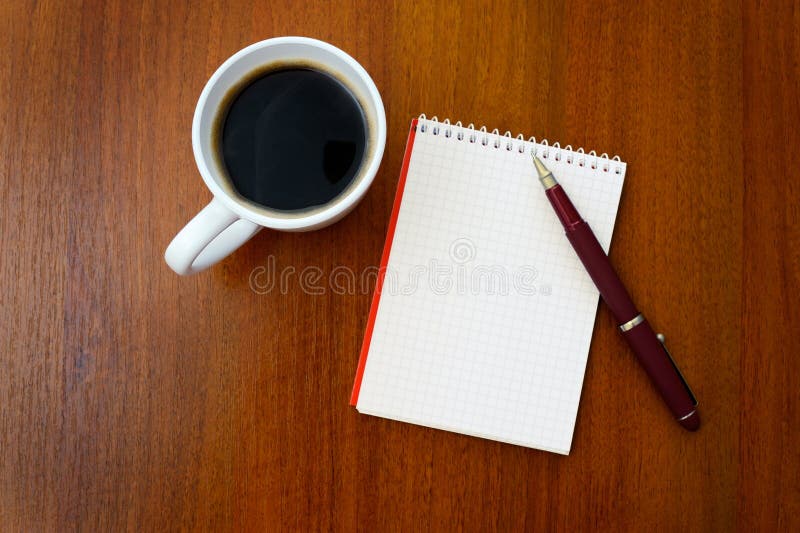 Pencil, coffee, notebook