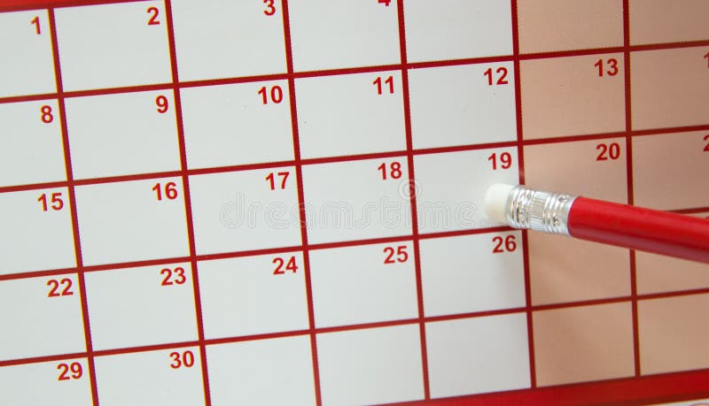 Pencil eraser on calendar royalty free stock image