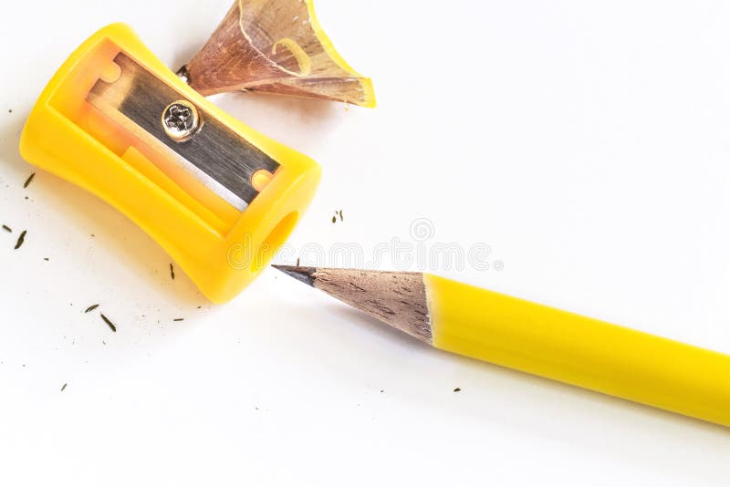 Pencil-sharpener and pencil isolated on white paper background.