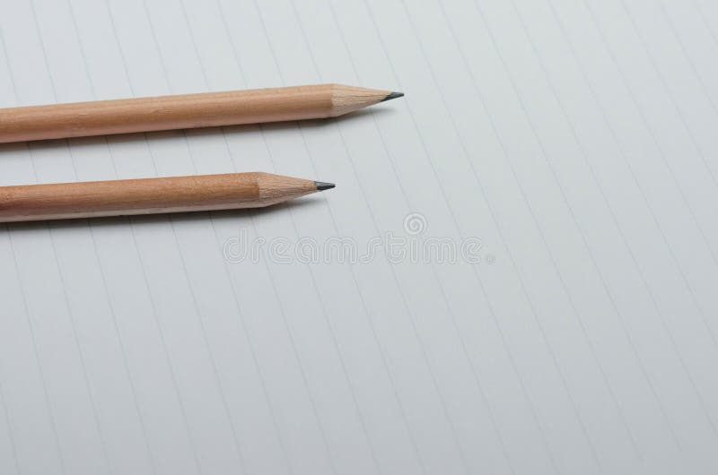Pencils on the Lined Paper. Stock Photo Image of white, background