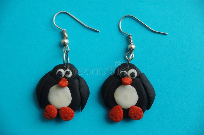 Beautiful penguin earrings, hand made.