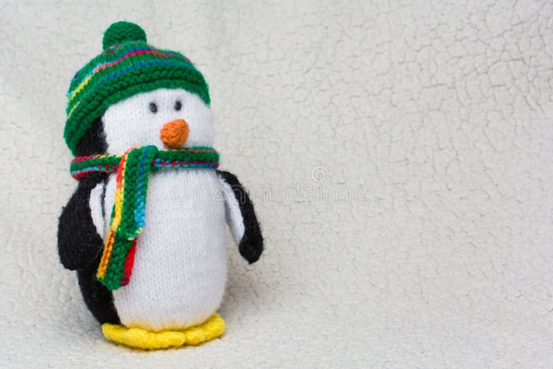 Penguin Stuffed Toy On White Fluffy Background Copy Space Stock Photo - Image of colored, cold