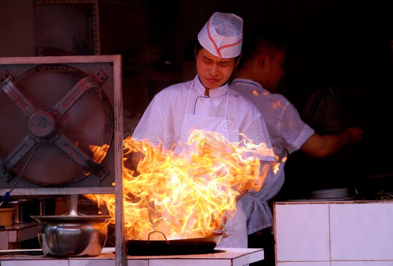 Pengzhou, China: Chef Stir-Frying Food