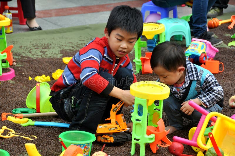Pengzhou, China: Children at Play with Toys