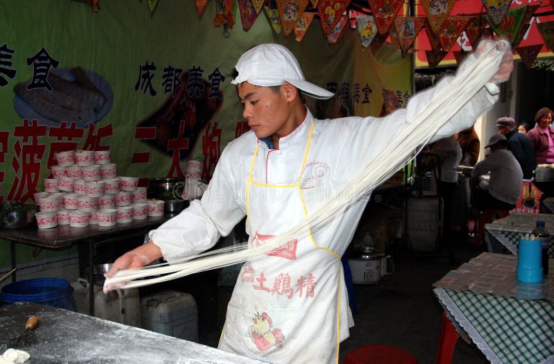 Pengzhou, China: Man Making Noodles