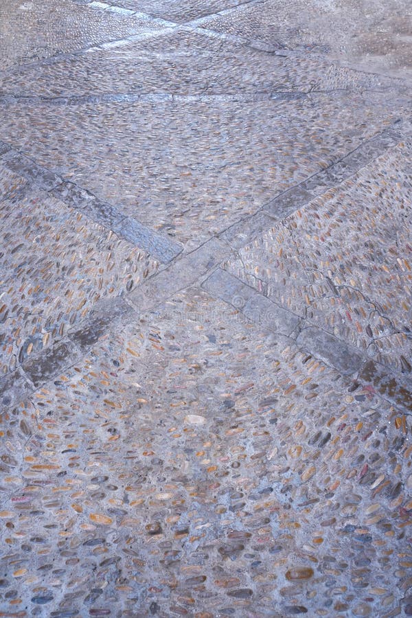 Peniscola detail of floor rolling stones mosaic in Castellon stock photo Peniscola detail of floor rolling stones mosaic in Castellon stock photo