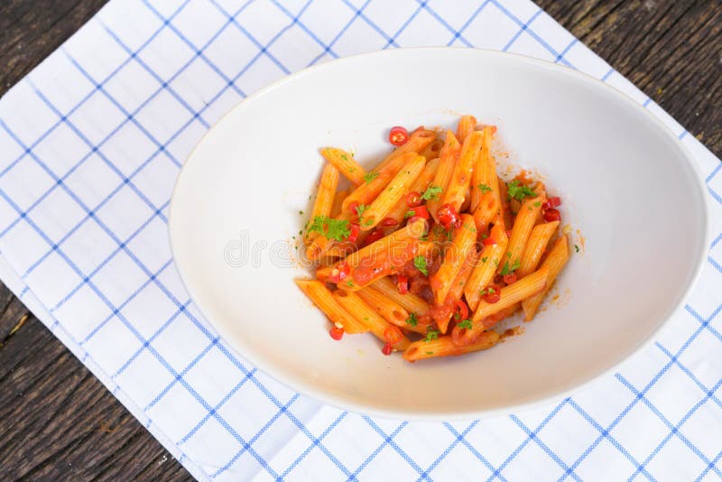 Penne Pasta with Arrabiata Sauce Stock Image - Image of napkin, dish ...