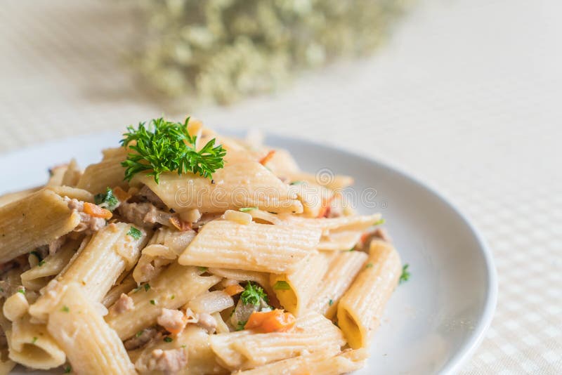 Penne pasta cream cheese stock image. Image of basil 94651695
