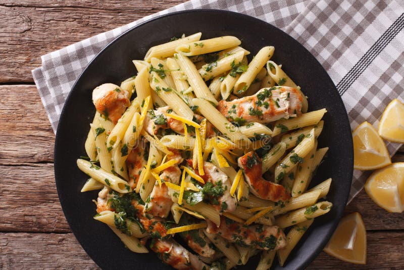 Penne Pasta with Grilled Chicken, Greens and Lemon Sauce Close-up
