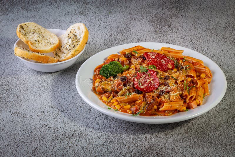 Penne Pasta with Tomato Sauce and Vegetables Stock Photo - Image of