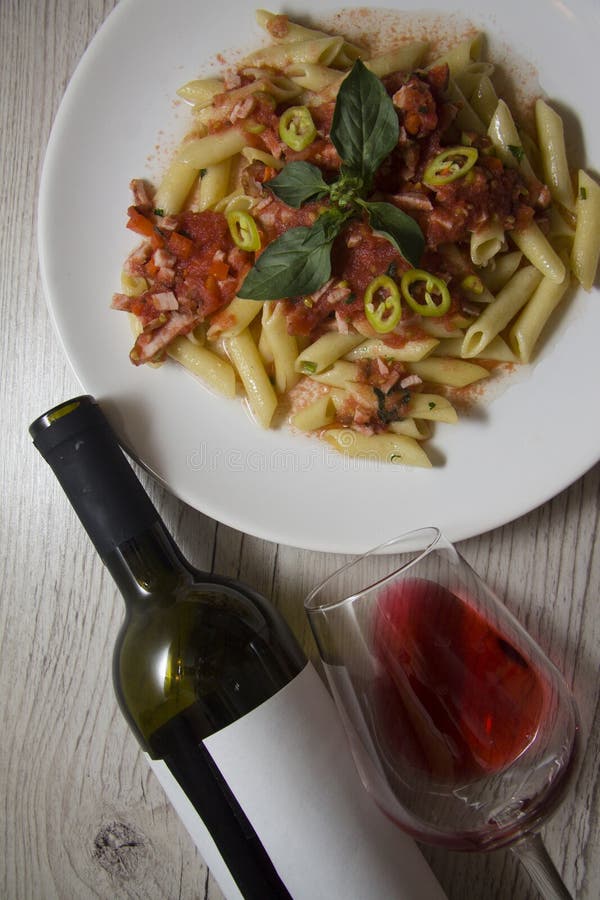 Penne and red wine stock image. Image of ingredient, fork 63091265