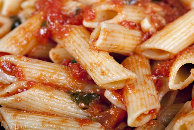 Penne with tomato sauce stock image. Image of isolated - 16922345