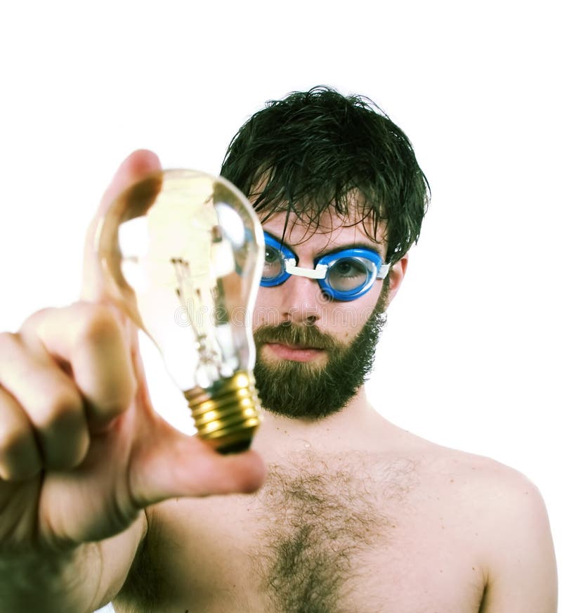 A funny looking male with a bear and swimming goggles, holding a clear light. Concept image for fresh thinking, new ideas. A funny looking male with a bear and swimming goggles, holding a clear light. Concept image for fresh thinking, new ideas.