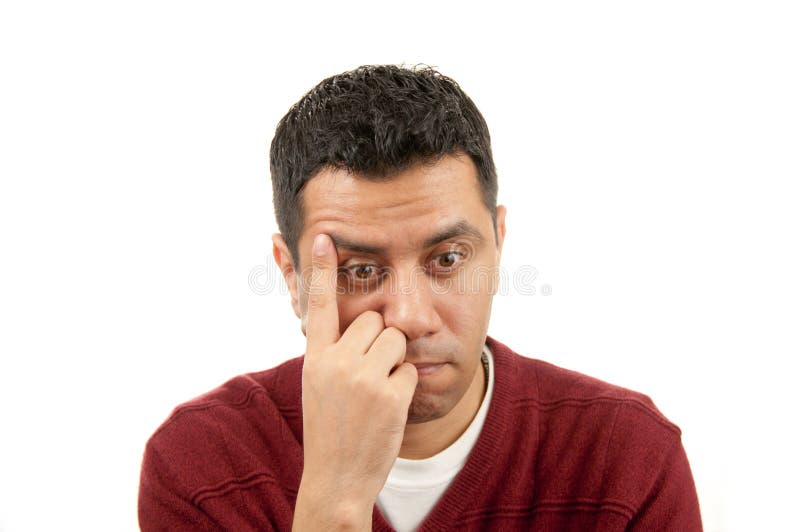 Pensiero ed upset del giovane immagini stock libere da diritti Pensiero ed upset del giovane immagini stock libere da diritti