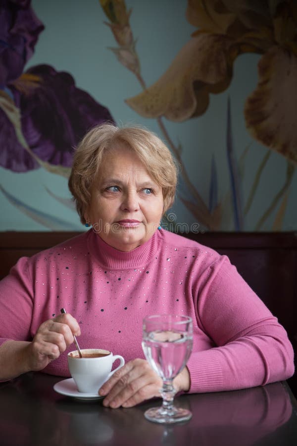 Pensioner Russian woman in cafe royalty free stock photos Pensioner Russian woman in cafe royalty free stock photos