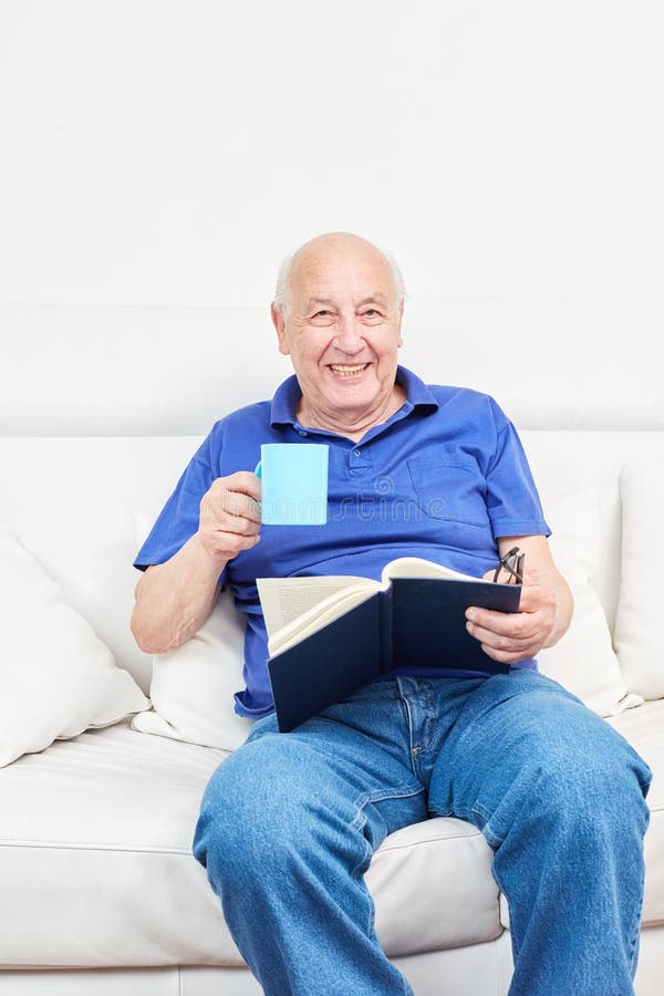 Pensioner in a senior residence drinks coffee royalty free stock photography Pensioner in a senior residence drinks coffee royalty free stock photography