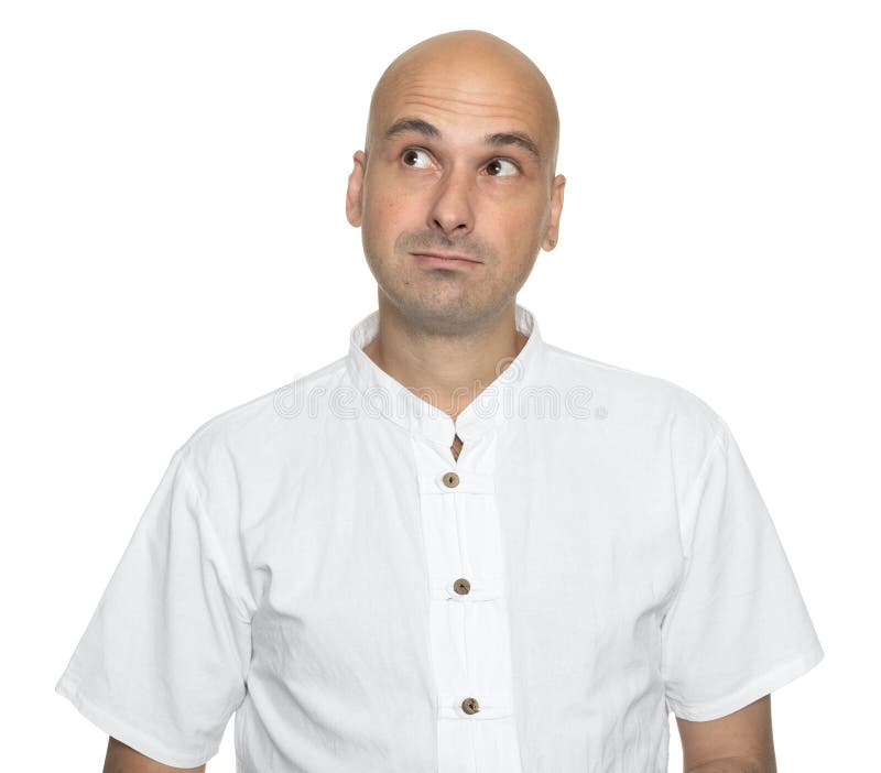 Pensive bald man smiling looking up. Isolated royalty free stock photos Pensive bald man smiling looking up. Isolated royalty free stock photos