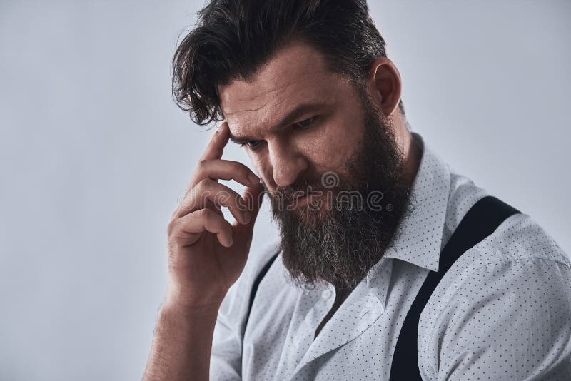 Pensive bearded man stock image Pensive bearded man stock image