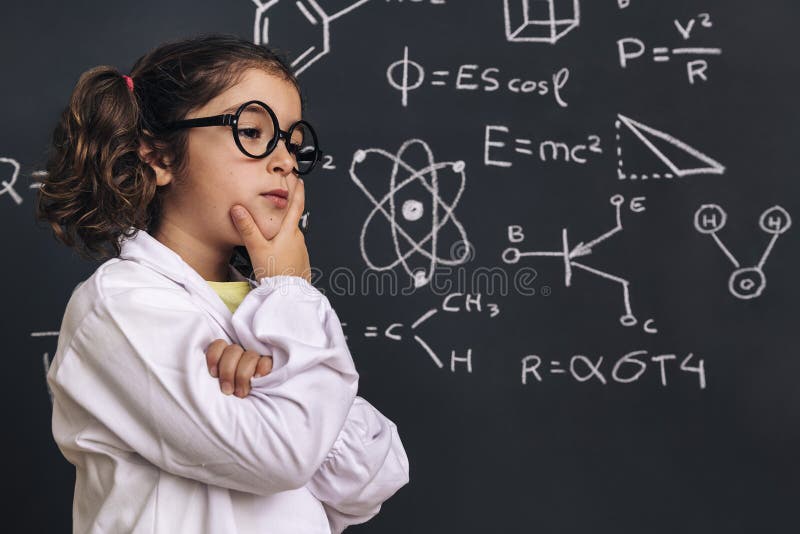 Pensive little girl scientist in lab coat