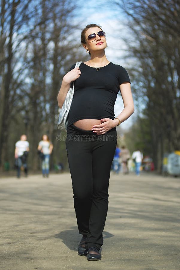 Pensive pregnant woman