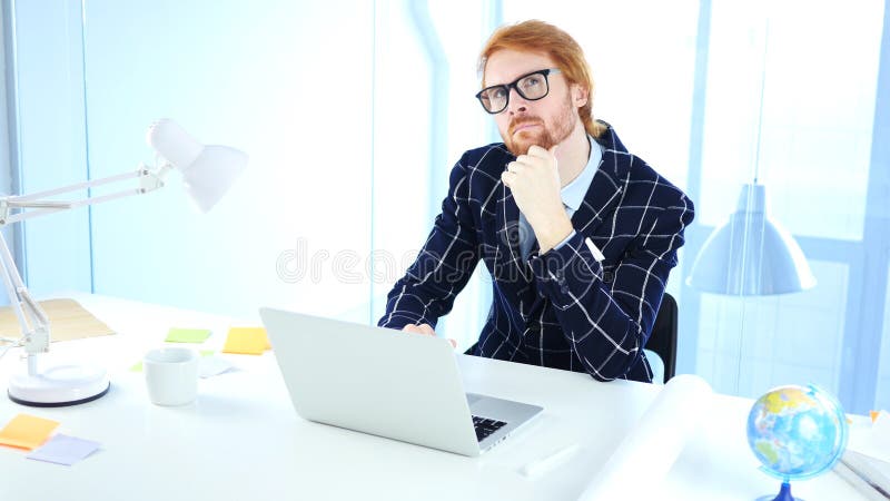 Pensive Redhead Businessman Thinking New Idea at Work, Creative Designer stock photos Pensive Redhead Businessman Thinking New Idea at Work, Creative Designer stock photos