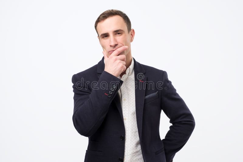 Pensive young italian man is thinking about his job. stock photo Pensive young italian man is thinking about his job. stock photo