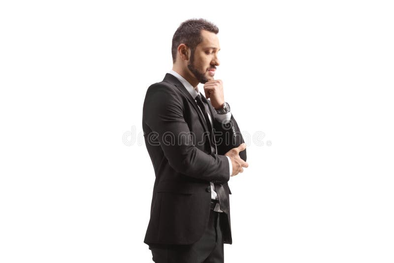 Pensiver junger Geschäftsmann stockfotografie