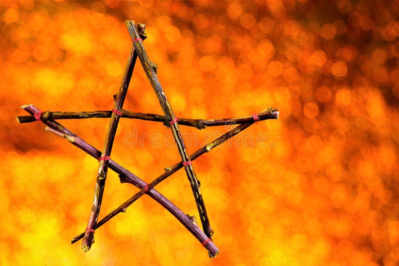 Pentagram of branches background Bokeâ€” five elements: Fire, Water, Air, Metal, Earth and Life. Pentacle symbol of the Goddess of the starry sky - Nuit, power ruler. In the esoteric sign for magic spells. Pentagram of branches background Bokeâ€” five elements: Fire, Water, Air, Metal, Earth and Life. Pentacle symbol of the Goddess of the starry sky - Nuit, power ruler. In the esoteric sign for magic spells