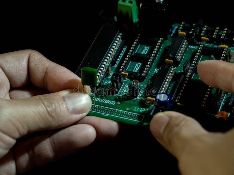 People Assembly Electronic Part of To Board Stock Photo Image of motherboard, arduino 197278804