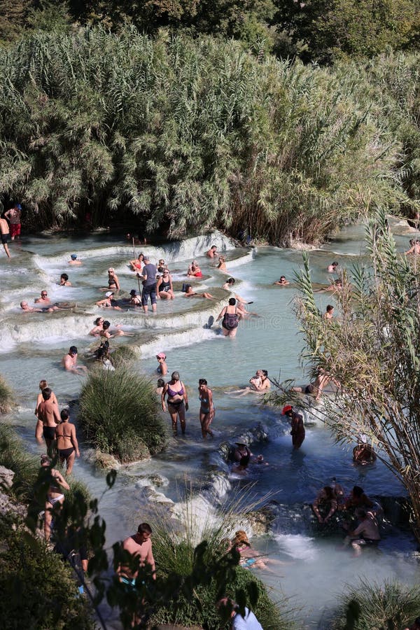 People are bathing in the hot springs of Saturnia Therme, Saturnia, Tuscany, Italy