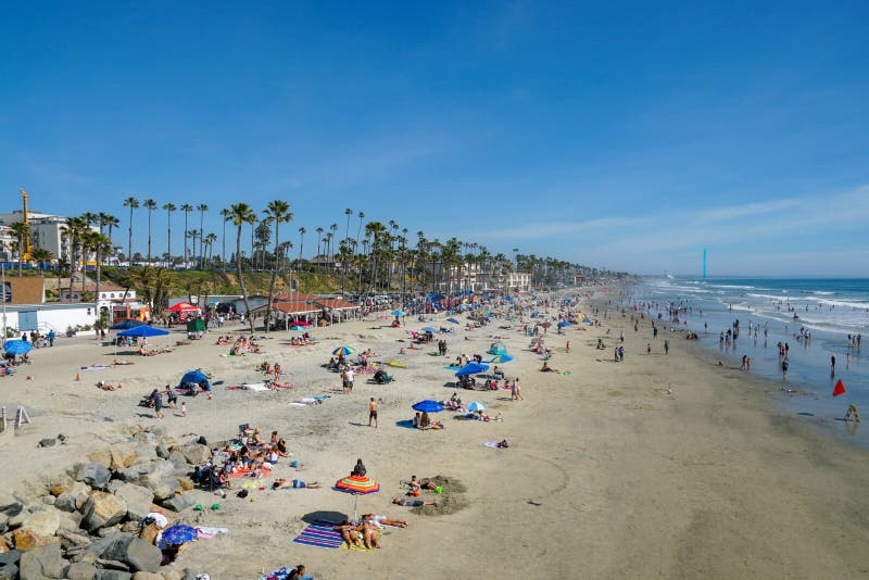People on the Beach Enjoying Beautiful Summer Day at Oceanside Beach ...
