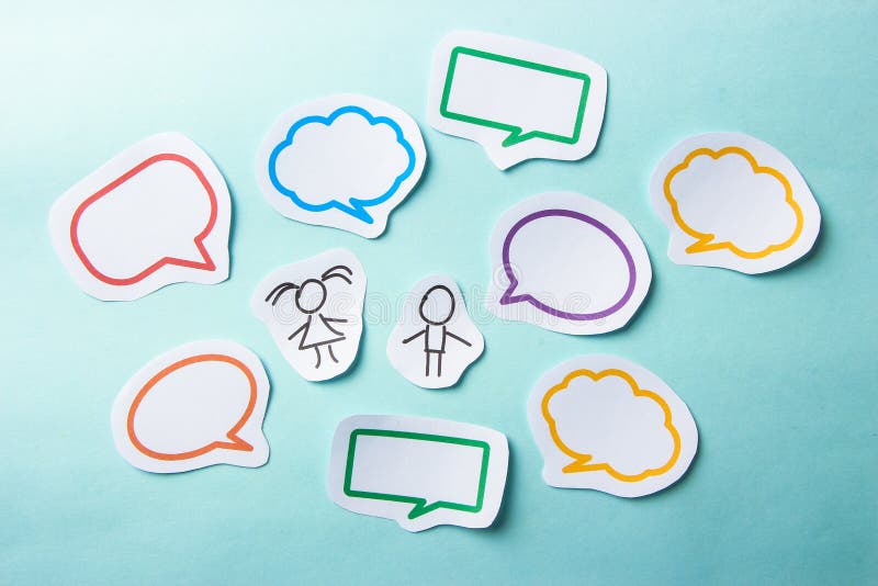 Paper people with colorful blank dialog speech bubbles. Social networking concept. Paper people with colorful blank dialog speech bubbles. Social networking concept.