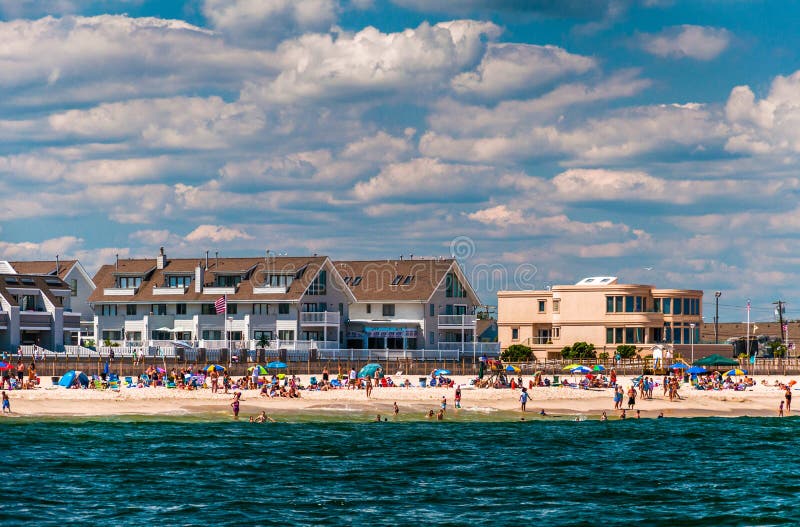 People and buildings on the beach in Point Pleasant Beach, New J