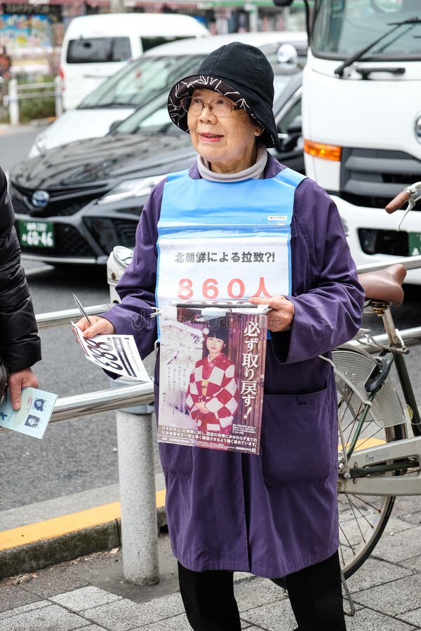 People call for immediate return of Japanese citizens abducted by North Korea. People demonstrate on the street near Ueno Park to call for immediate return of stock photo People call for immediate return of Japanese citizens abducted by North Korea. People demonstrate on the street near Ueno Park to call for immediate return of stock photo