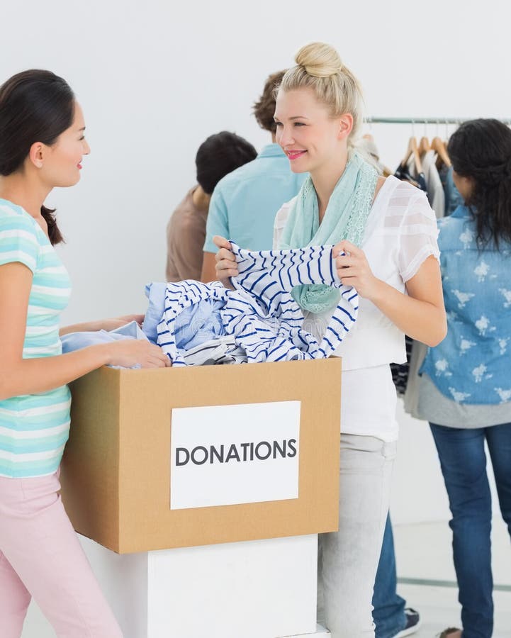 People with Clothes Donation Gesturing Thumbs Up Stock Image - Image of ...