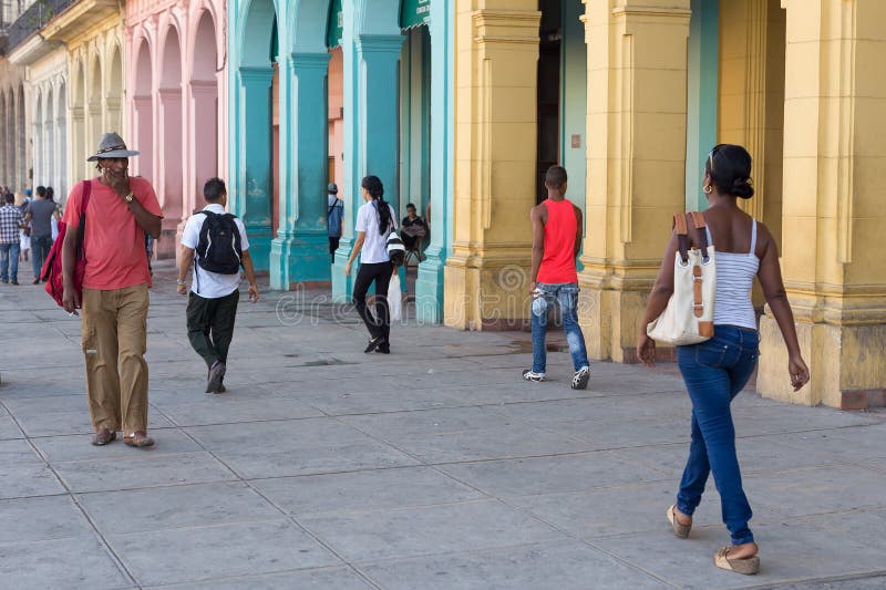 People in a colorful street in Havana, Cuba royalty free stock photos People in a colorful street in Havana, Cuba royalty free stock photos