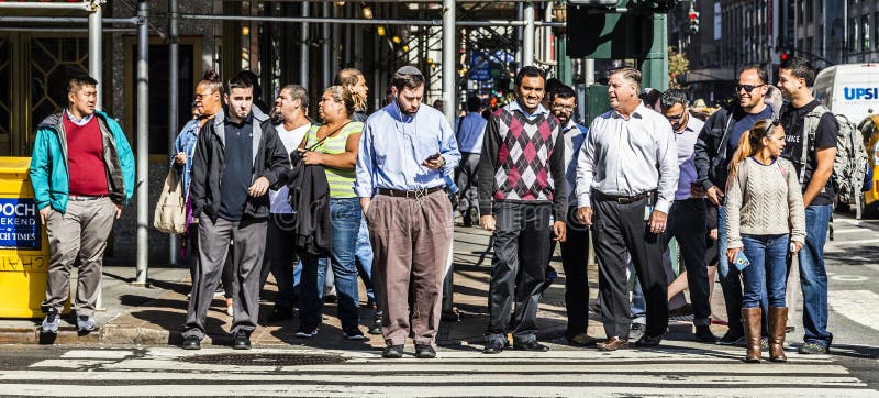 People crossing a street at a pedestrian crossing in New York stock photos People crossing a street at a pedestrian crossing in New York stock photos