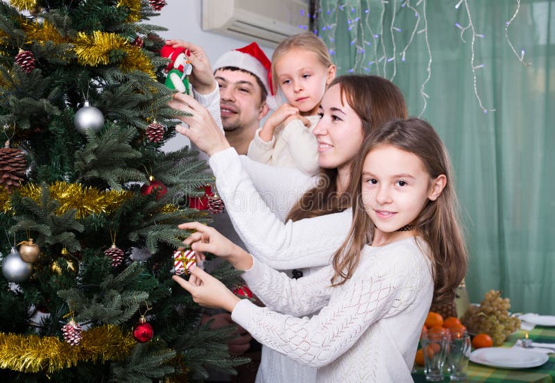 People Decorating Christmas Tree Stock Image - Image of female, girl ...