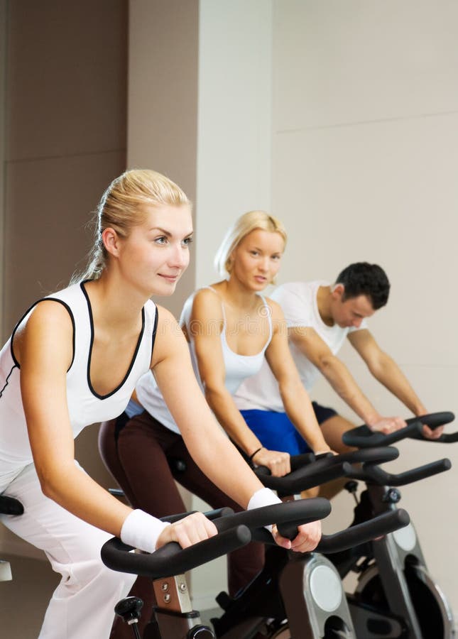 People doing exercise stock photo. Image of bike, club - 7941928