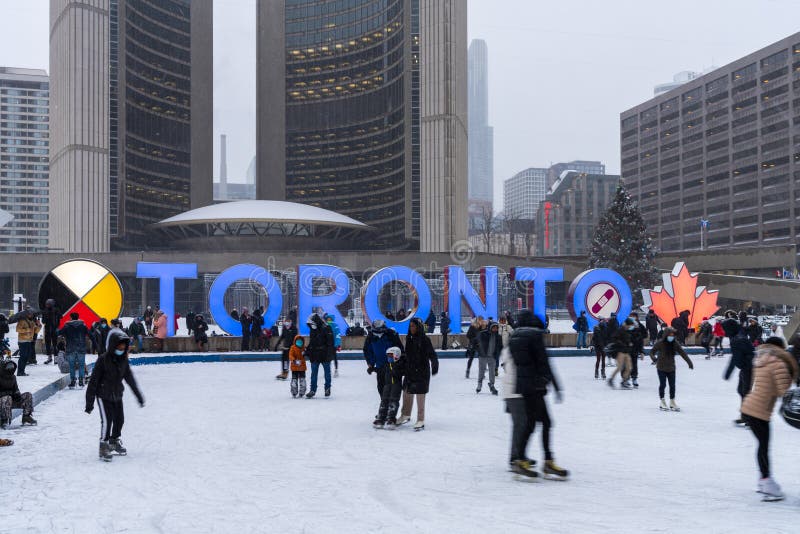 People Doing Ice Skating at Nathan Phillips Square in Winter Day ...