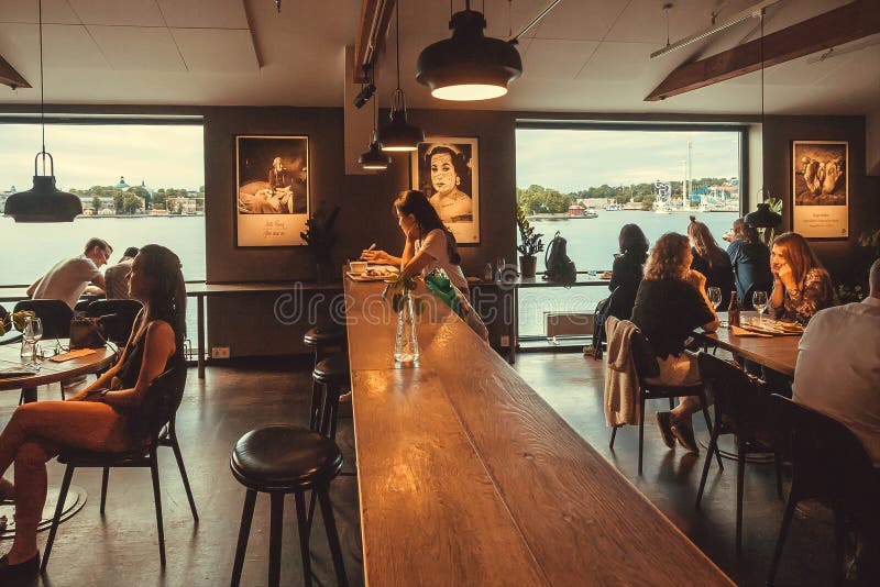 People Drinking and Eating Food Inside Restaurant of the Cultural Center  Fotografiska Editorial Photography - Image of reservation, decor: 120648252