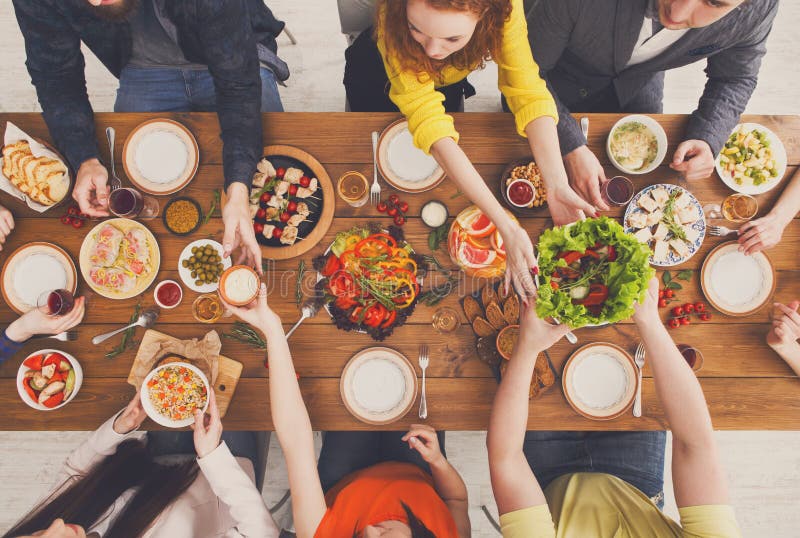 People Eat Healthy Meals at Served Table Dinner Party Stock Photo