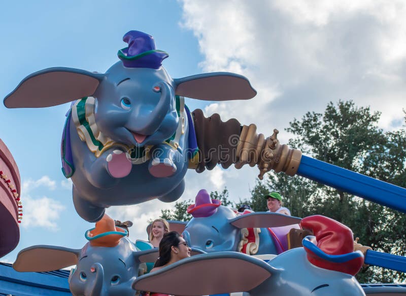 People enjoying Dumbo the Flying Elephant at Magic Kigndom 3