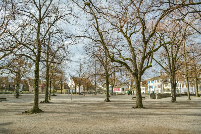 People enjoying their time in Lindenhof park in Zurich stock photo People enjoying their time in Lindenhof park in Zurich stock photo