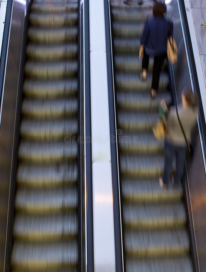 People on escalators