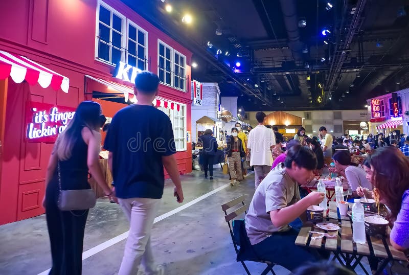 People in food street festival at Queen Sirikit National Convention Center at Ratchadaphisek road, Khlong Toei District Bangkok Thailand, October 1, 2022